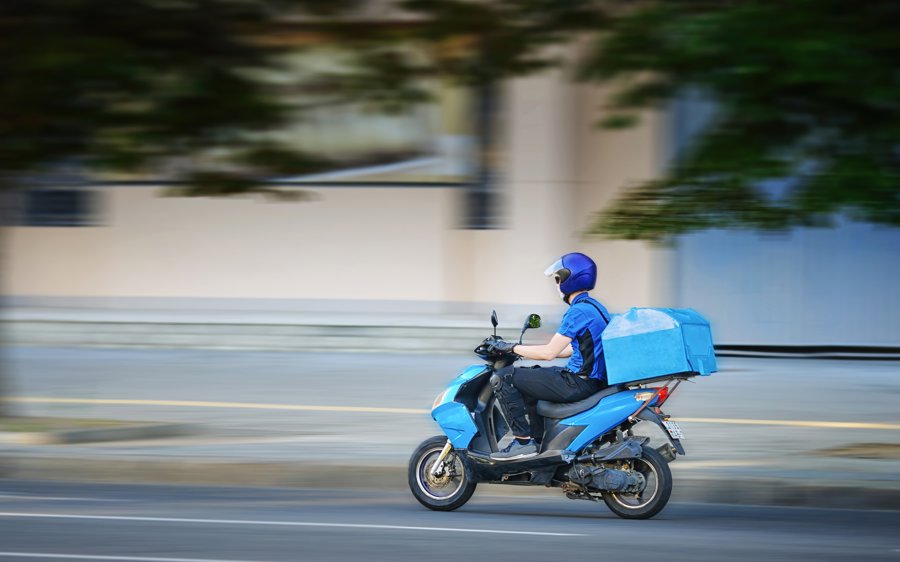 Courier handling a timed same day delivery