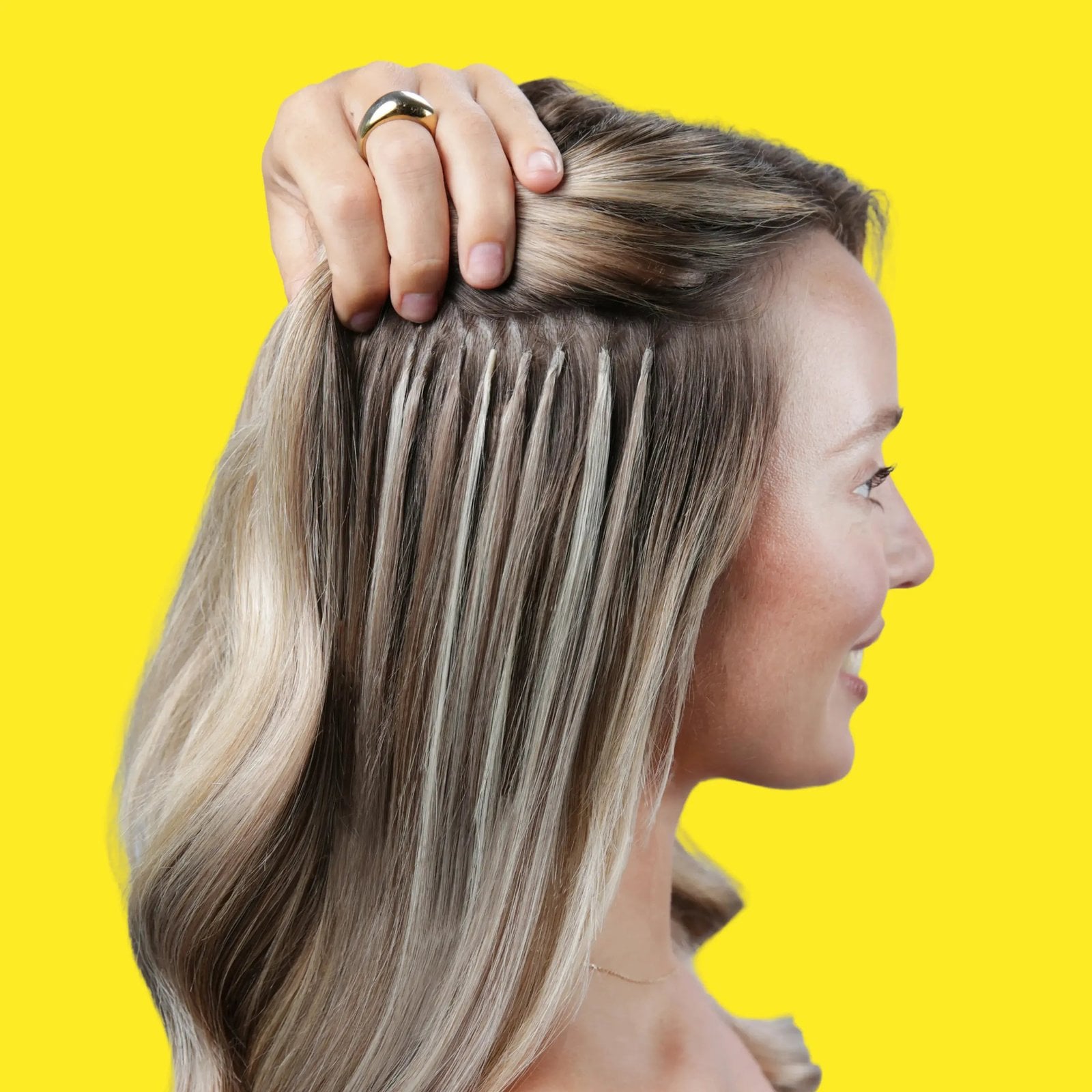 Flat tip hair extensions shown in use