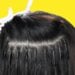 Nano ring hair extensions shown in use in styled hair