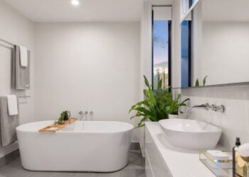 Contemporary bathroom with a bathtub and bright natural light