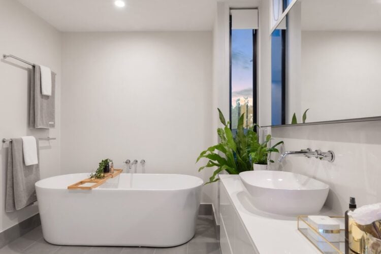 Contemporary bathroom with a bathtub and bright natural light