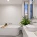 Contemporary bathroom with a bathtub and bright natural light