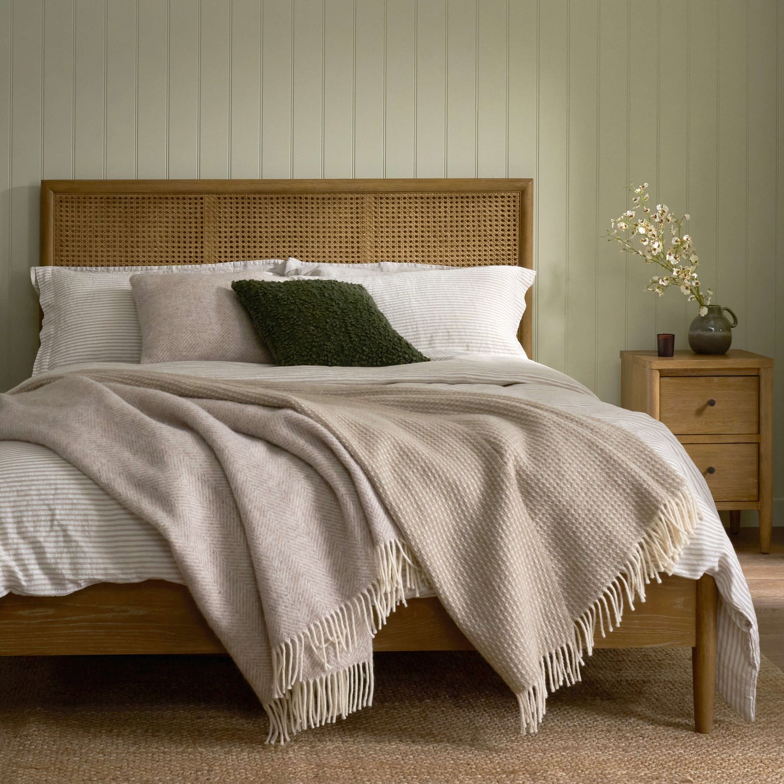 Adina Rattan bed with woven headboard and weathered oak frame