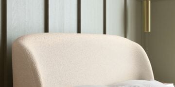 Cambourne bed detail showing latte boucle upholstery