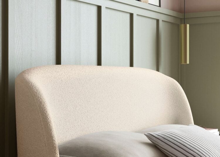 Cambourne bed detail showing latte boucle upholstery