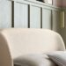 Cambourne bed detail showing latte boucle upholstery