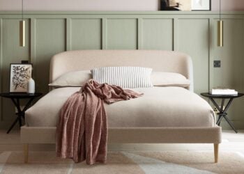 Cambourne upholstered king bed in latte bouclé with curved headboard
