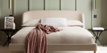 Cambourne upholstered king bed in latte bouclé with curved headboard