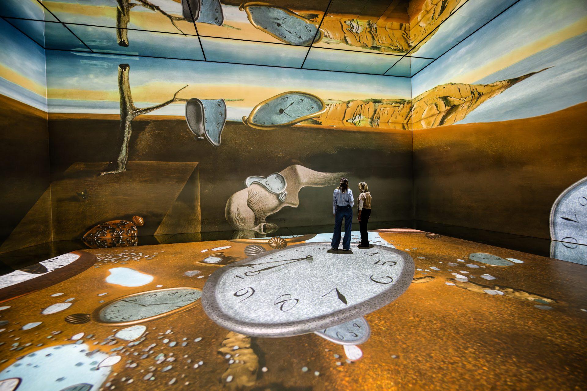 Surreal projected details from Dalí's The Persistence of Memory at Frameless