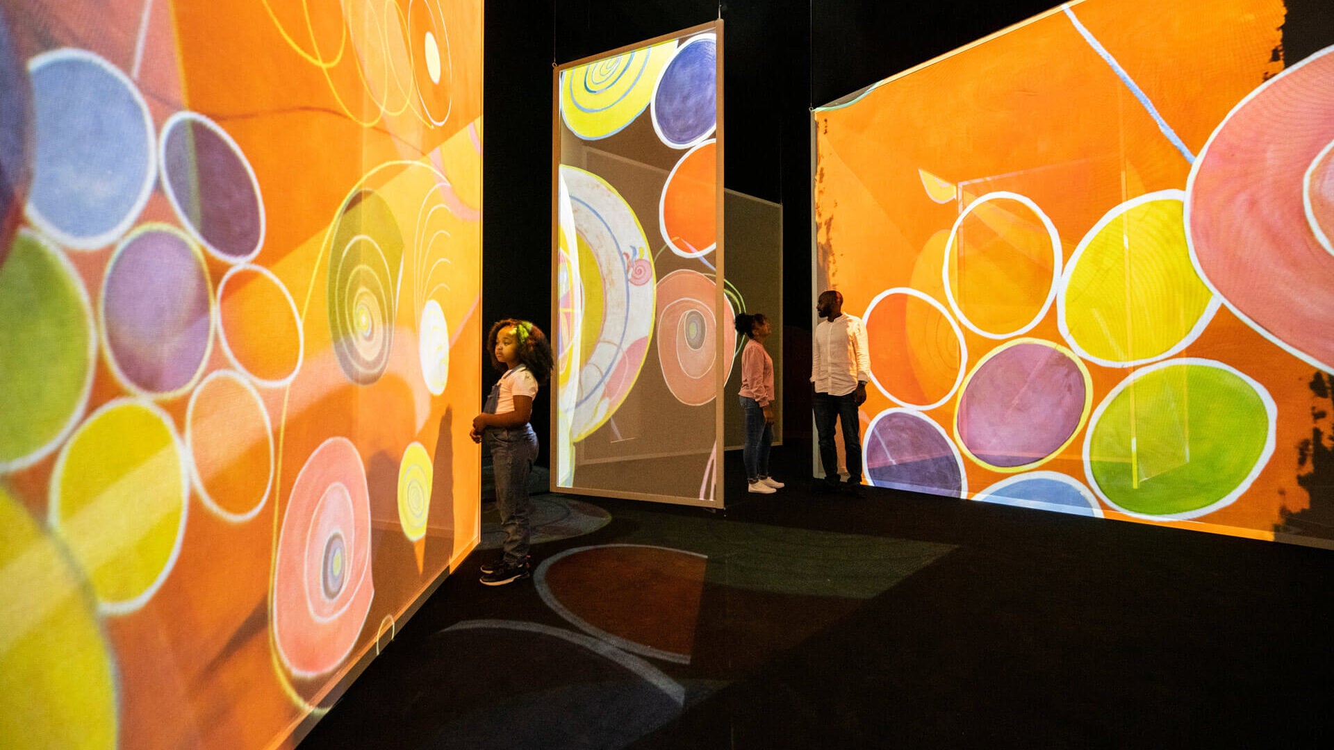 Colourful Hilma af Klint artwork projected in Frameless
