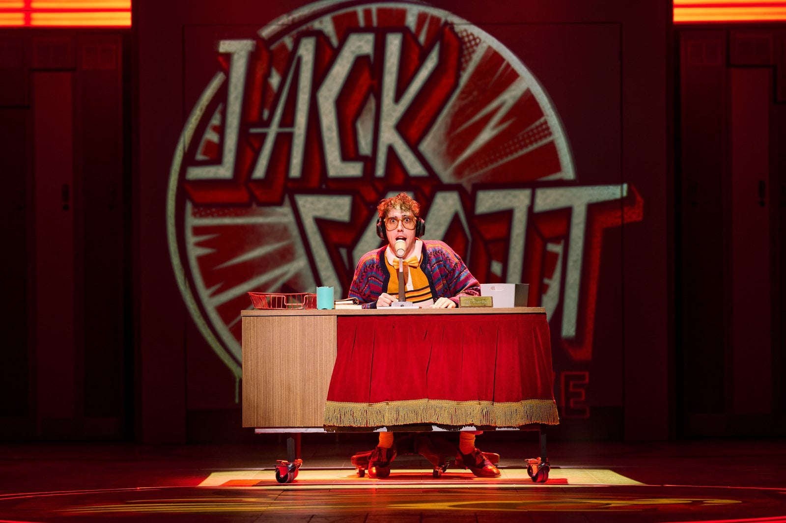 High School Musical performers in a lively ensemble scene