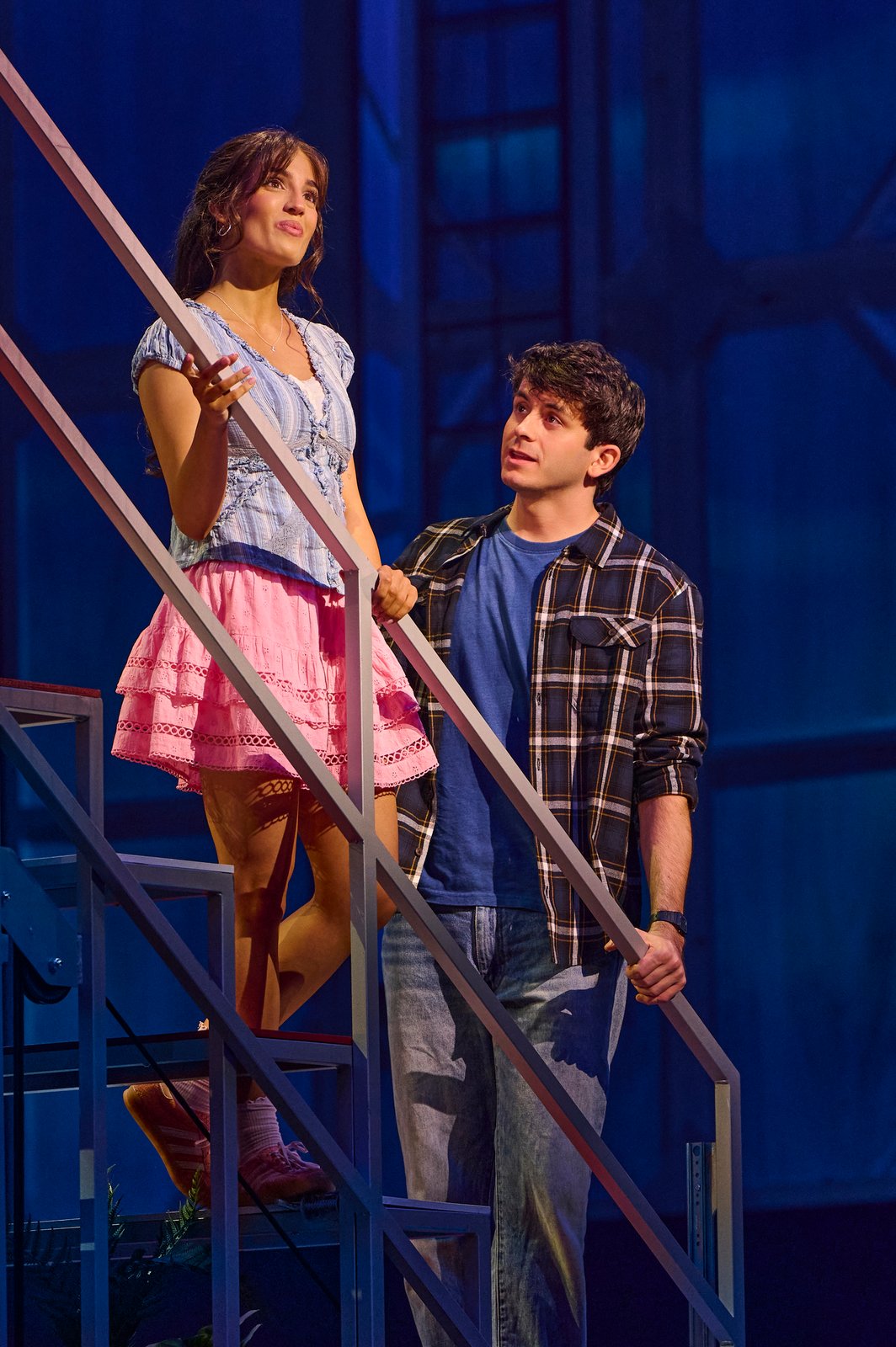 Two High School Musical performers on stairs