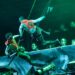 Actors performing in a dramatic Hunger Games on Stage scene