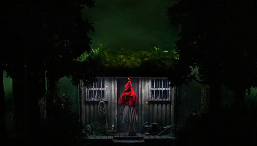 Actors performing in the Into the Woods stage production