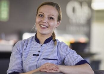 Smiling ferry crew member aboard Dublin Swift