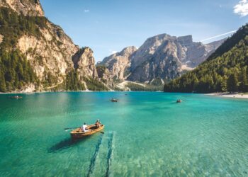 Mountain lake landscape for a slow early-autumn travel escape