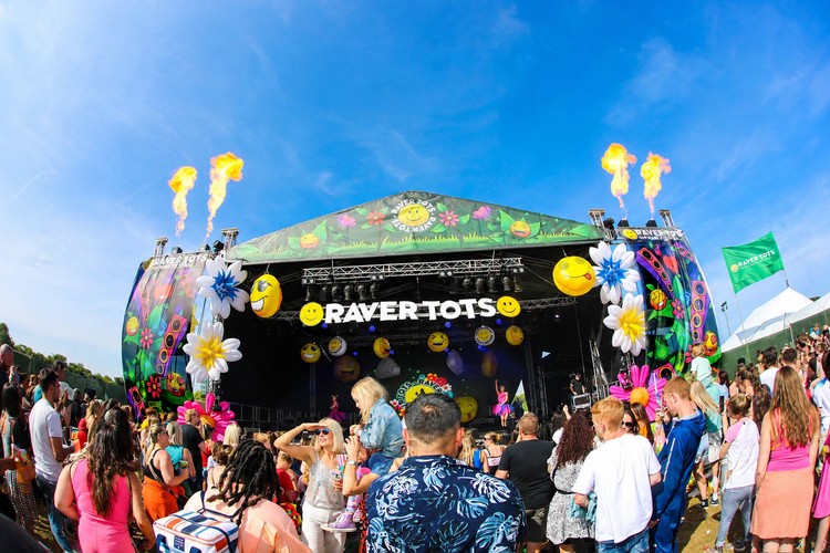 Families enjoying an outdoor Raver Tots event