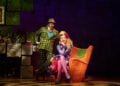 Matilda cast performing a scene on stage