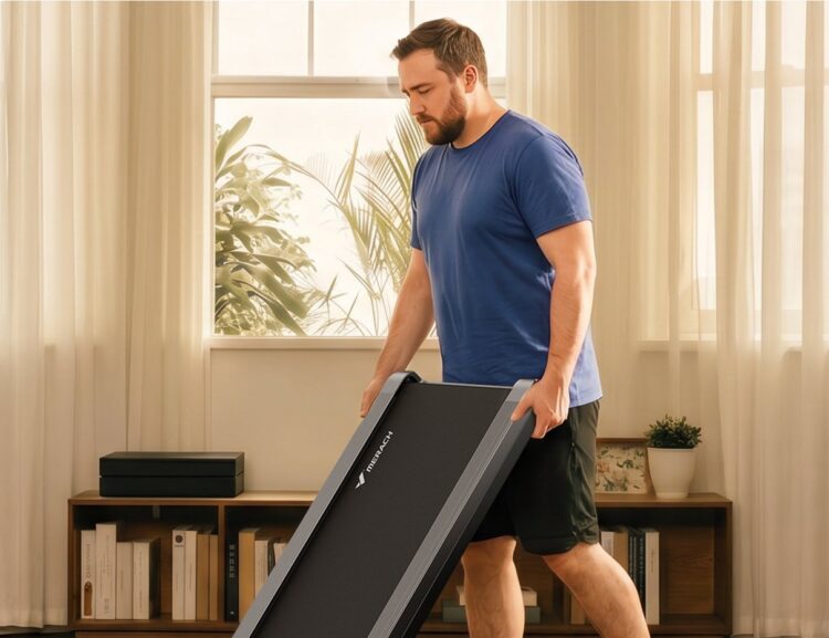 Person storing the Merach UltraWalk W60 Plus walking pad in a home