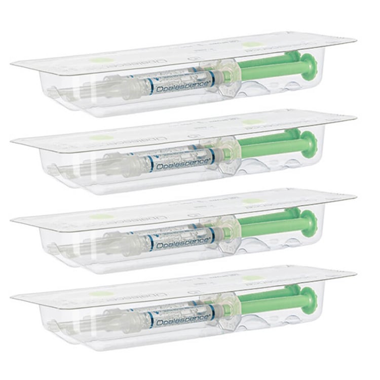 Opalescence teeth whitening gel syringes arranged together