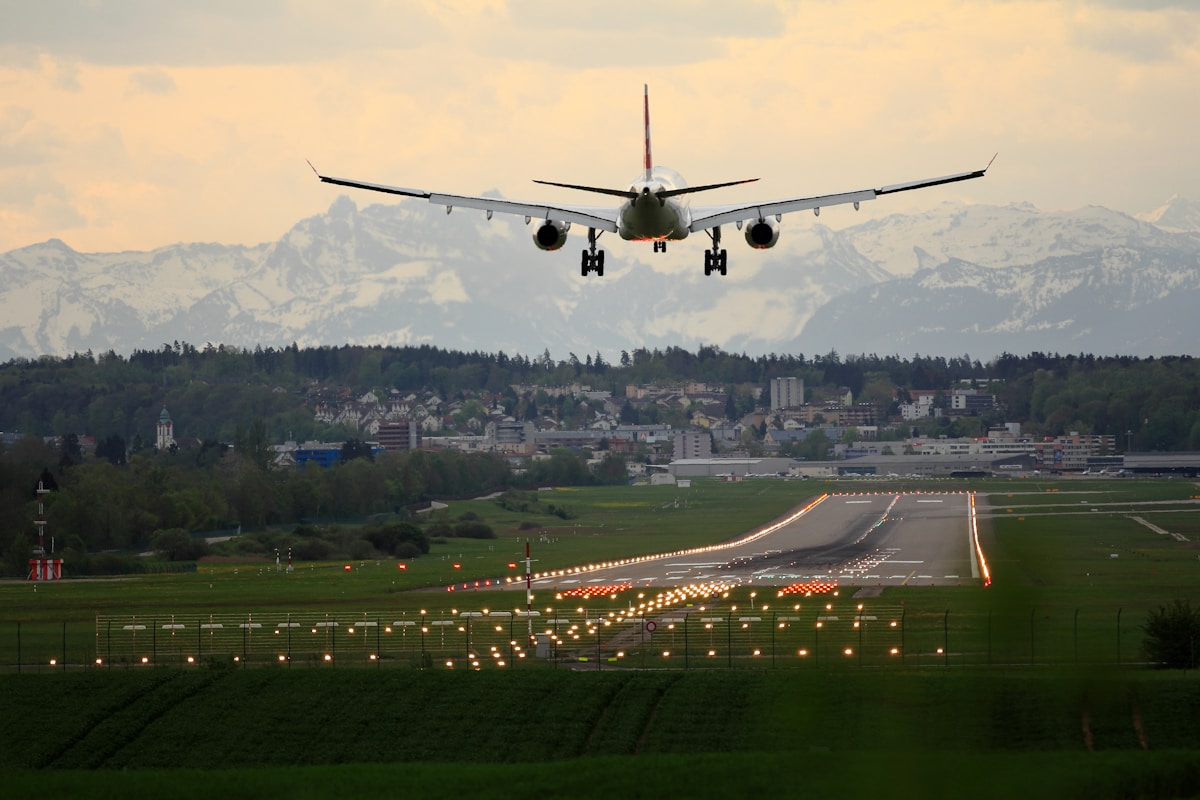 Airplane landing over a runway