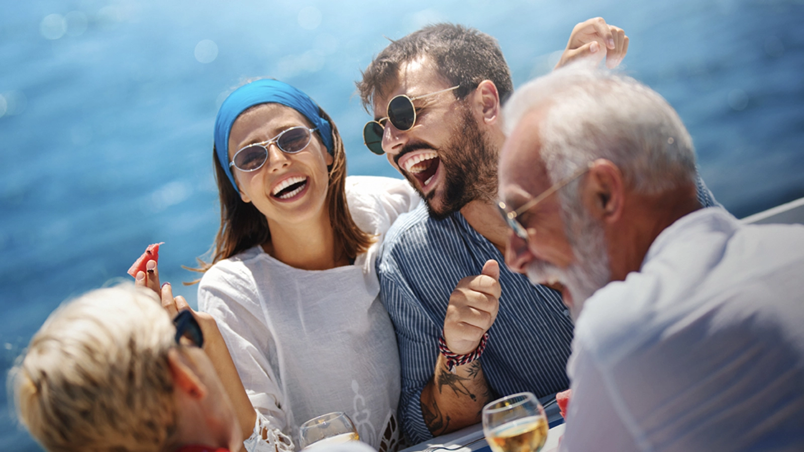 People laughing together on a boat