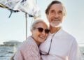 Mature couple enjoying a sailing trip while considering heart condition cover