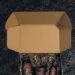 Open Sacred By Sam gift box with botanical products arranged in shredded paper