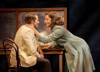 Actors performing in a live scene from Sinatra the Musical