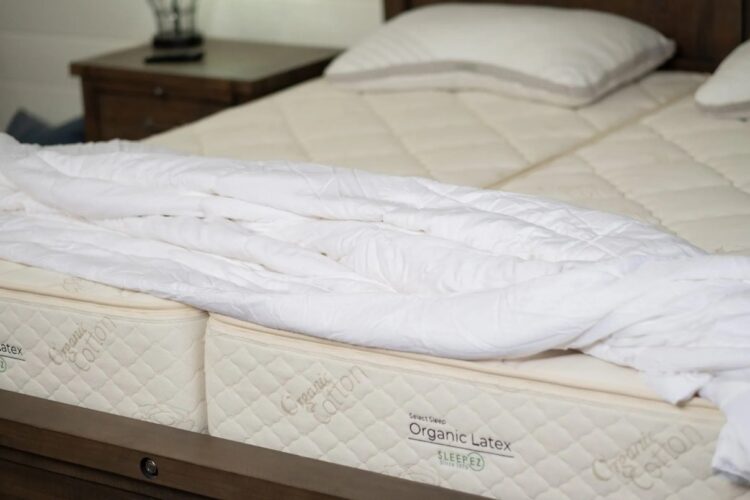 Organic latex mattress shown in a bright bedroom