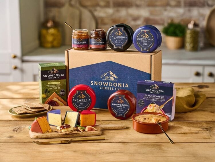 Cheese, chutney, crackers and Black Bomber cheese bake gift box arranged for sharing