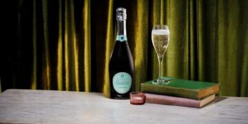 Gold Lounge Experience table with a glass of Prosecco