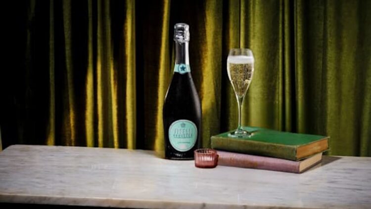 Gold Lounge Experience table with a glass of Prosecco