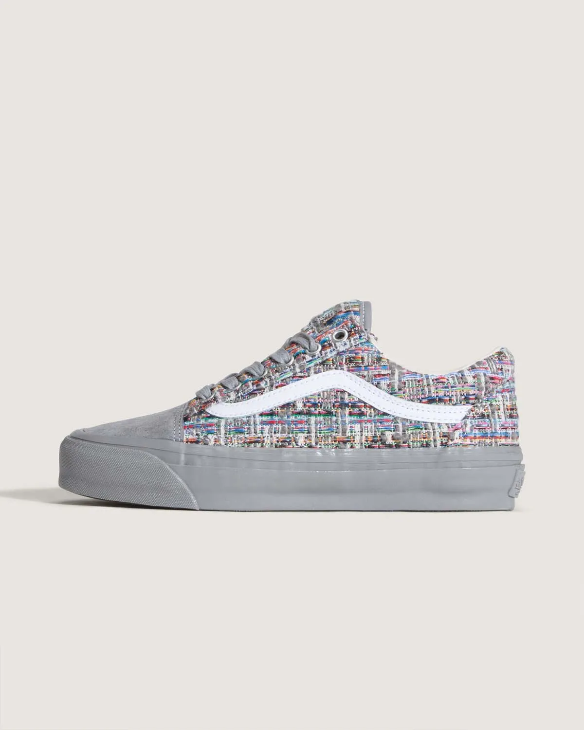 Gray multicolor Vans Old Skool shoe shown from the side
