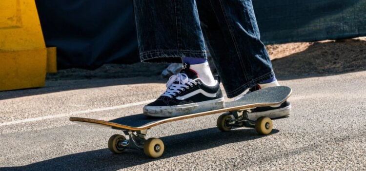 Old Skool shoes featured in a wide skate-inspired Vans campaign scene