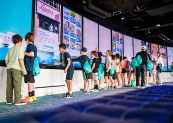 Children using interactive displays at View Boston