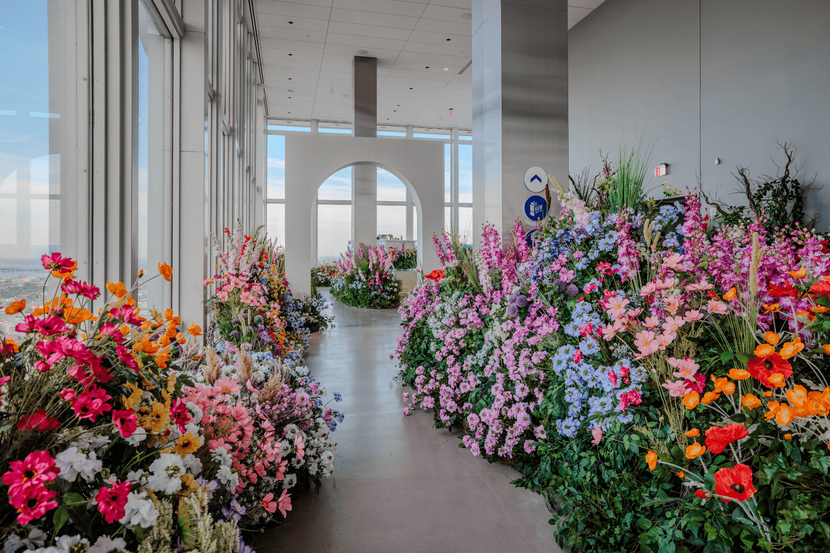Colorful floral installation inside Summer Reimagined at View Boston