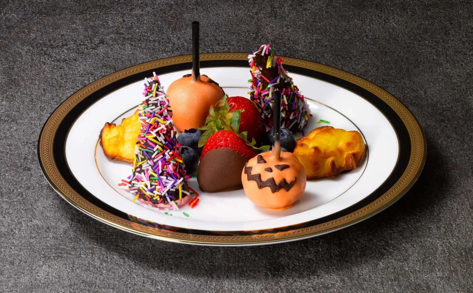 Halloween-themed sweets on the top plate of the high tea
