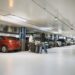 Airport parking garage with rows of parked vehicles
