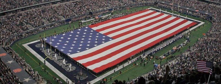 A view of the field and flag at AT&T Stadium