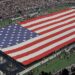 A view of the field and flag at AT&T Stadium