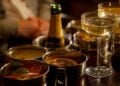 Food and drinks arranged on a table at the Kit Kat Club