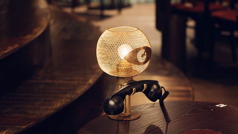 A table lamp and telephone in the Kit Kat Club