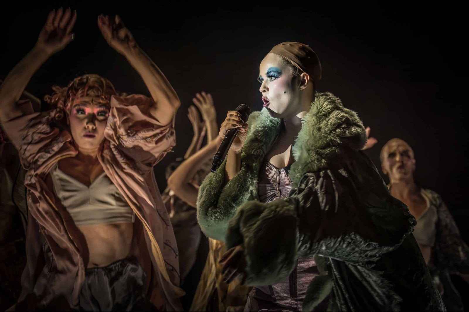 Cabaret cast in a separate production scene