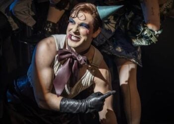 Cabaret performers in a Kit Kat Club stage scene