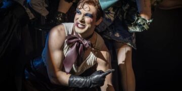 Cabaret performers in a Kit Kat Club stage scene