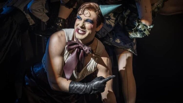 Cabaret performers in a Kit Kat Club stage scene