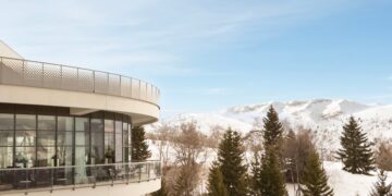 Alpe d'Huez resort buildings set against the French Alps