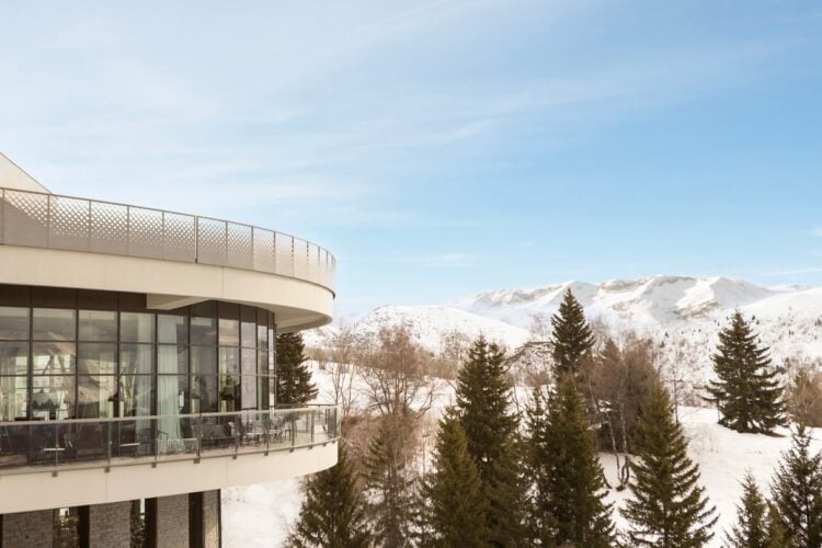 Alpe d'Huez resort buildings set against the French Alps