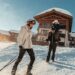 Skiers on a snowy Alpine slope at a Club Med resort